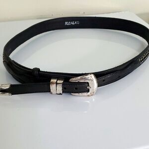 Black leather belt,‎ size 39"..by Alcala's. Silver hardware.